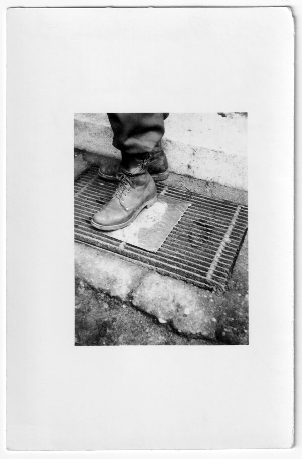 pjd-armando-decrescenzo-wwii-hitlers-face-wipe-their-feet-boots-sewer-grate-mannheim-1945-cc.jpeg