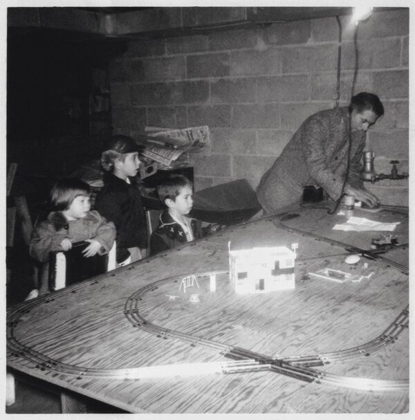 peter-decrescenzo-center-w-dad-and-siblings-xmas-lionel-trains-basement-ho-ho-kus-nj-12-1958-cc.jpg